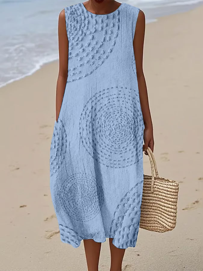 MAELLE | LONG SLEEVELESS DRESS WITH TEXTURED PATTERN